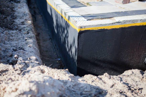 Professional Emergency Waterproofing technician working in Millwood, WA